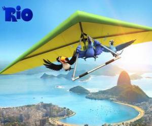 yapboz Rio de Janeiro kenti üzerinde uçan Blu papağan, toucan Rafael Jewel ve asmak planör